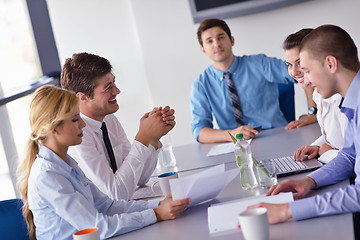 Image showing business people in a meeting at office