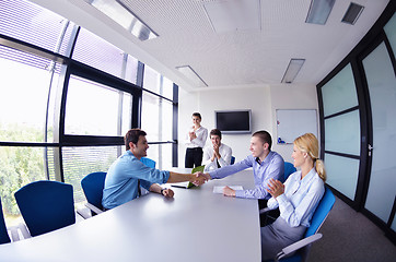 Image showing business people making deal