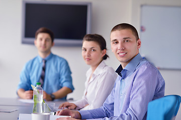 Image showing business people in a meeting at office