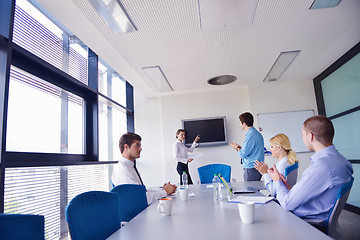 Image showing business people in a meeting at office