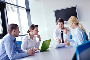 Image showing business people in a meeting at office