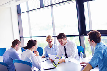 Image showing business people in a meeting at office