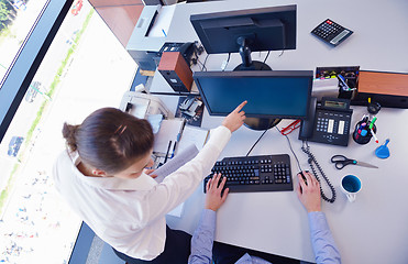 Image showing business people in a meeting at office