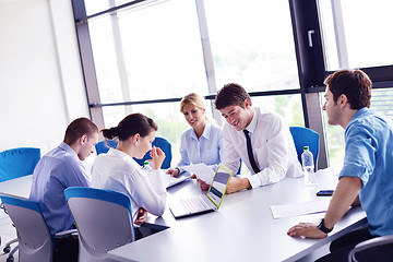 Image showing business people in a meeting at office