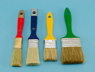 Image showing paint brush color size on blue 