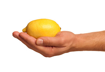 Image showing Hand with lemon