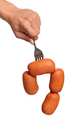 Image showing Sausage on fork