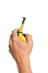 Image showing Hand with tape measure