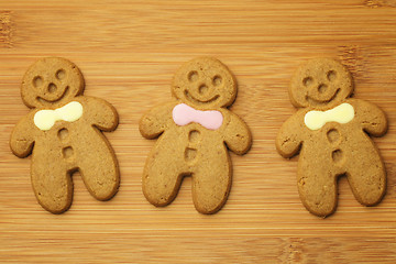 Image showing Gingerbread man cookie on wooden background