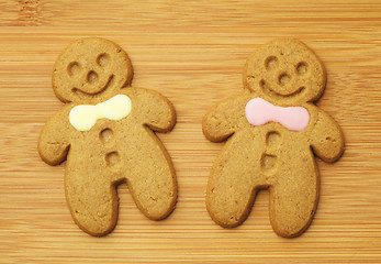 Image showing gingerbread man over wooden background
