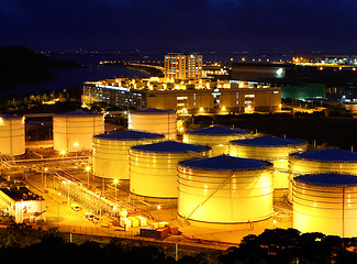 Image showing Oil tanks at night