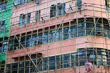 Image showing bamboo scaffolding of repairing old building 