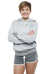 Image showing Attractive lady wearing winter sweater and shorts