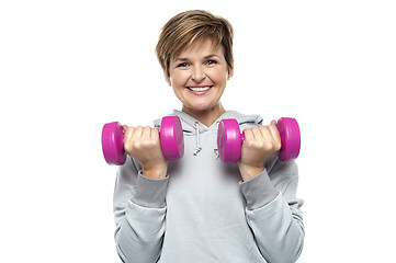 Image showing Beautiful young woman with dumbbells