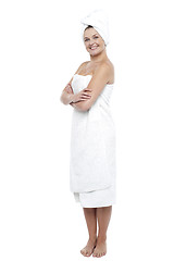 Image showing Pretty woman wrapped in white towel after bath
