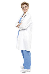 Image showing Full length portrait of a smiling female doctor