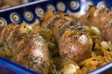 Image showing Roasted sausages with sauerkraut - polish dish