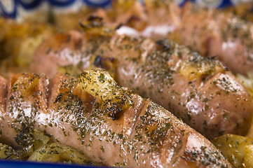 Image showing Roasted sausages with sauerkraut - polish dish