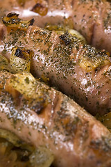 Image showing Roasted sausages with sauerkraut - polish dish