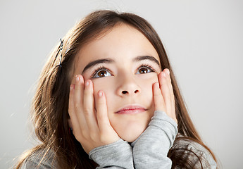 Image showing Little girl thinking