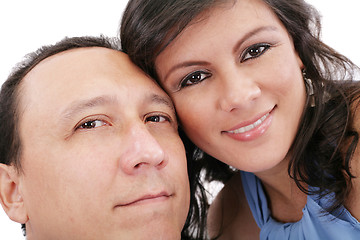 Image showing Closeup portrait of a sweet young couple smiling together 