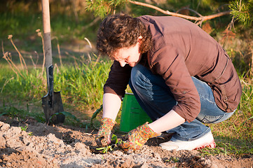 Image showing pretty woman in garden