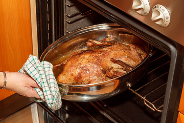 Image showing roast duck in the oven