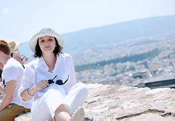 Image showing Greek woman on the streets of Oia, Santorini, Greece