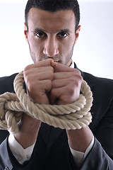 Image showing business man with rope isolated on white background