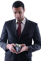 Image showing Business man holding money