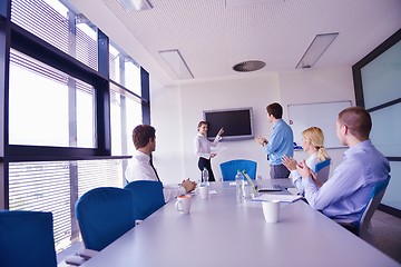 Image showing business people in a meeting at office