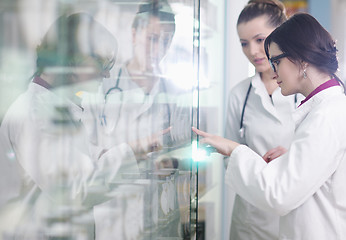 Image showing team of pharmacist chemist woman  in pharmacy drugstore