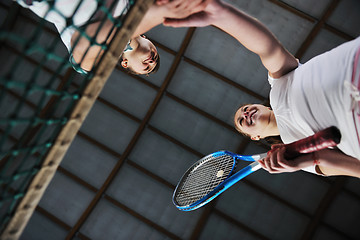 Image showing young girls playing tennis game indoor