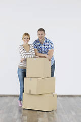 Image showing Young couple moving in new home