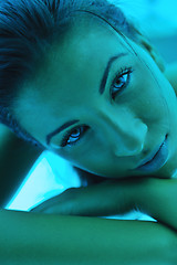 Image showing Beautiful young woman tanning in solarium