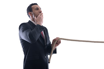 Image showing business man with rope isolated on white background