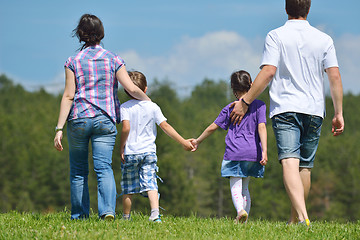 Image showing happy young family have fun outdoors