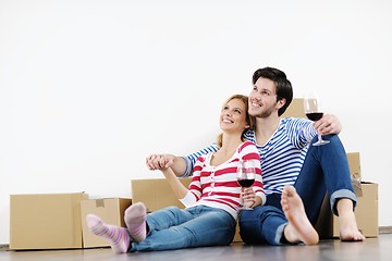 Image showing Young couple moving in new house