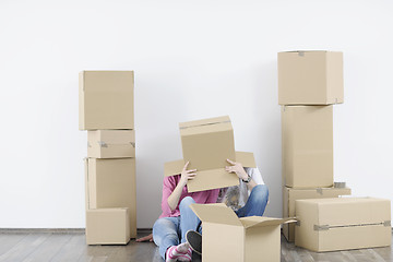 Image showing Young couple moving in new home