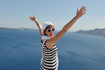 Image showing Greek woman on the streets of Oia, Santorini, Greece