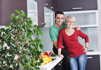 Image showing young couple have fun in modern kitchen