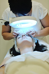 Image showing woman with facial mask in cosmetic studio