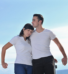 Image showing couple relaxing on balcony