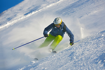 Image showing skiing on fresh snow at winter season at beautiful sunny day