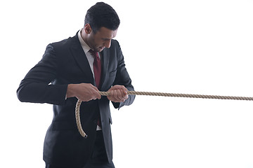 Image showing business man with rope isolated on white background