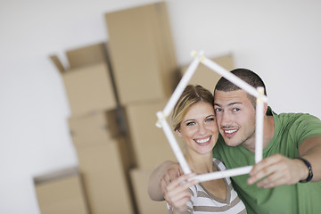 Image showing Young couple moving in new home