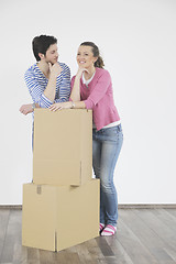 Image showing Young couple moving in new home