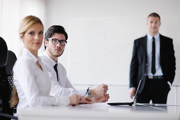 Image showing business people in a meeting at office