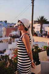 Image showing Greek woman on the streets of Oia, Santorini, Greece