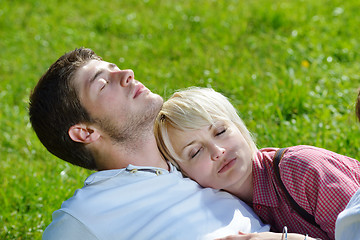 Image showing Portrait of romantic young couple smiling together outdoor